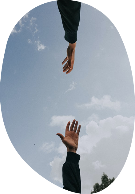 Two hands reaching out to each other